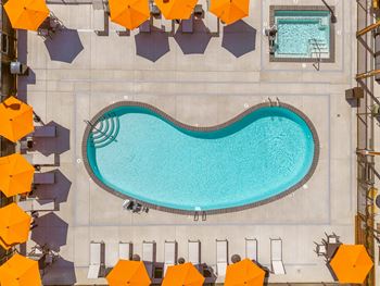 Swimming pool with hot tub